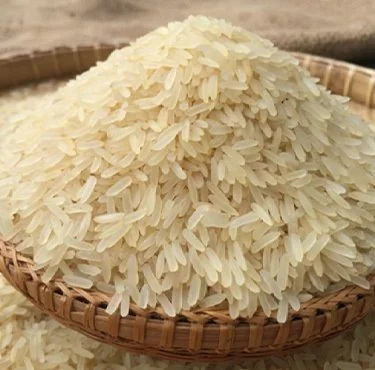 A heap of long-grain basmati rice in a woven basket